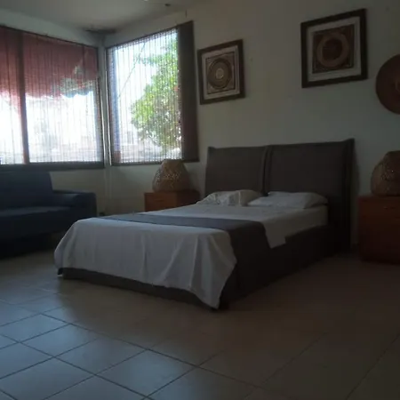 Habitación en casa particular Habitación Diagonal A La Muralla&la Serrezuela - Detrás De La Playa *